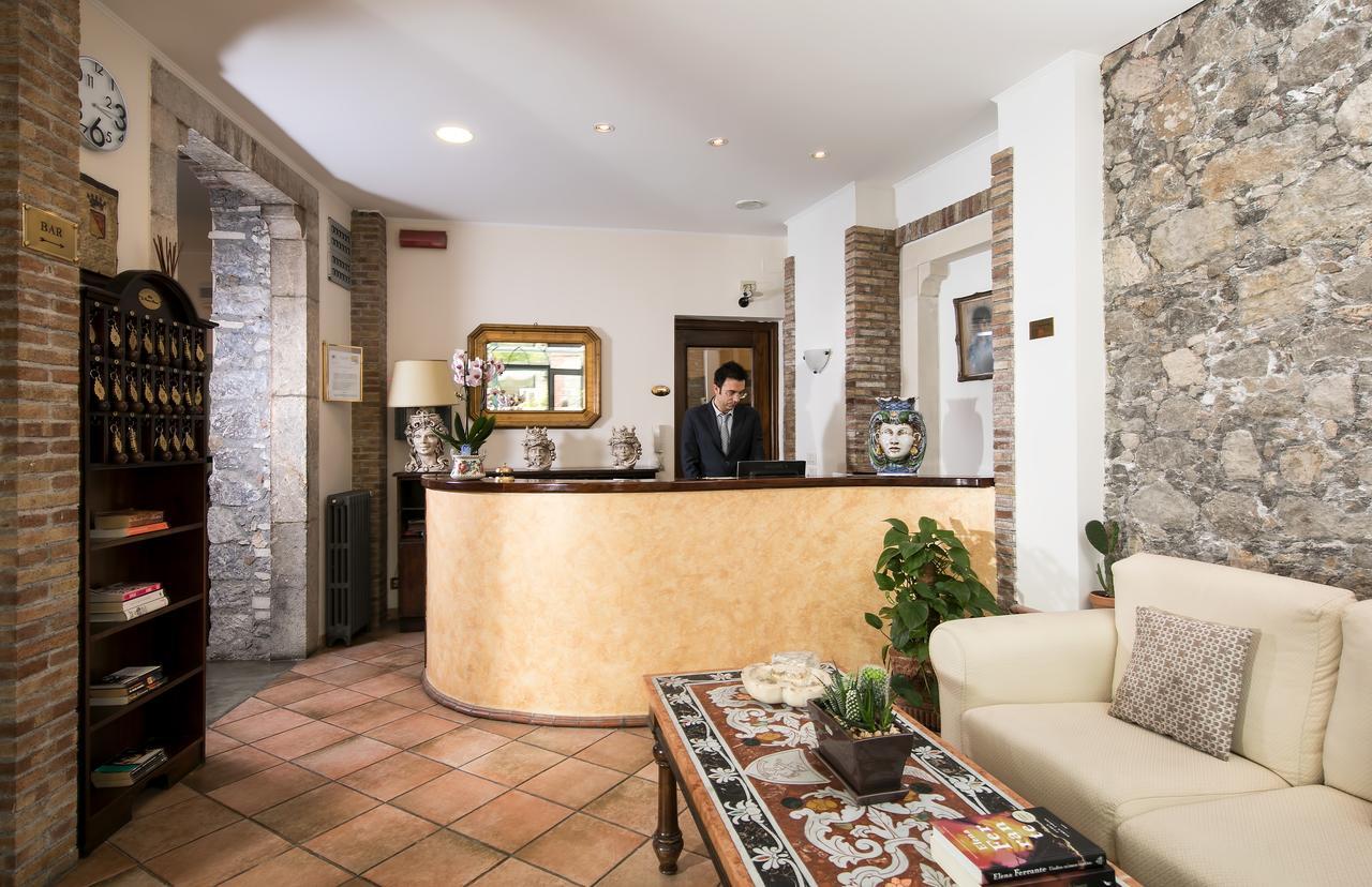 Hotel "La Pensione Svizzera" Таормина Экстерьер фото